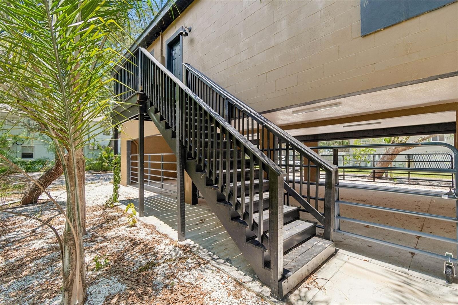 Balcony and stairs leading to 2nd floor