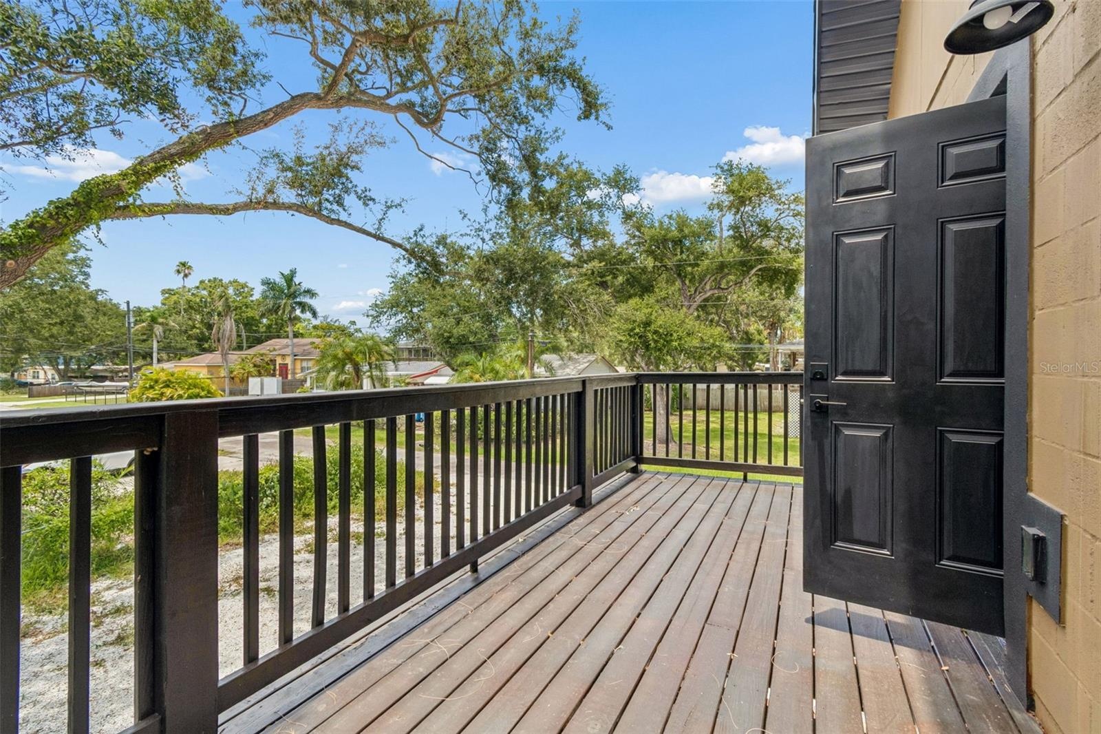 Primary bedroom balcony at the rear of the home