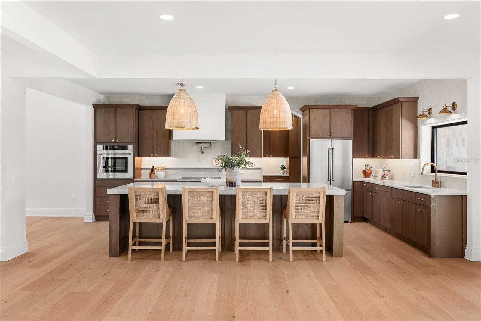 LUXURIOUS CHEF'S KITCHEN SHOWCASING HIGH-END APPLIANCES AND EXCEPTIONAL DESIGN