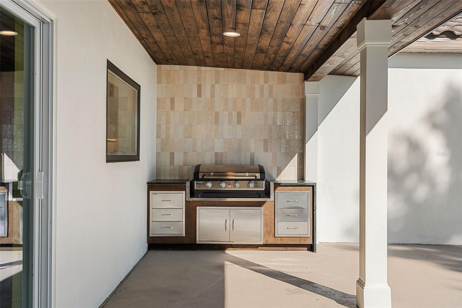 RENOVATED CEDAR CEILING BACK PATIO