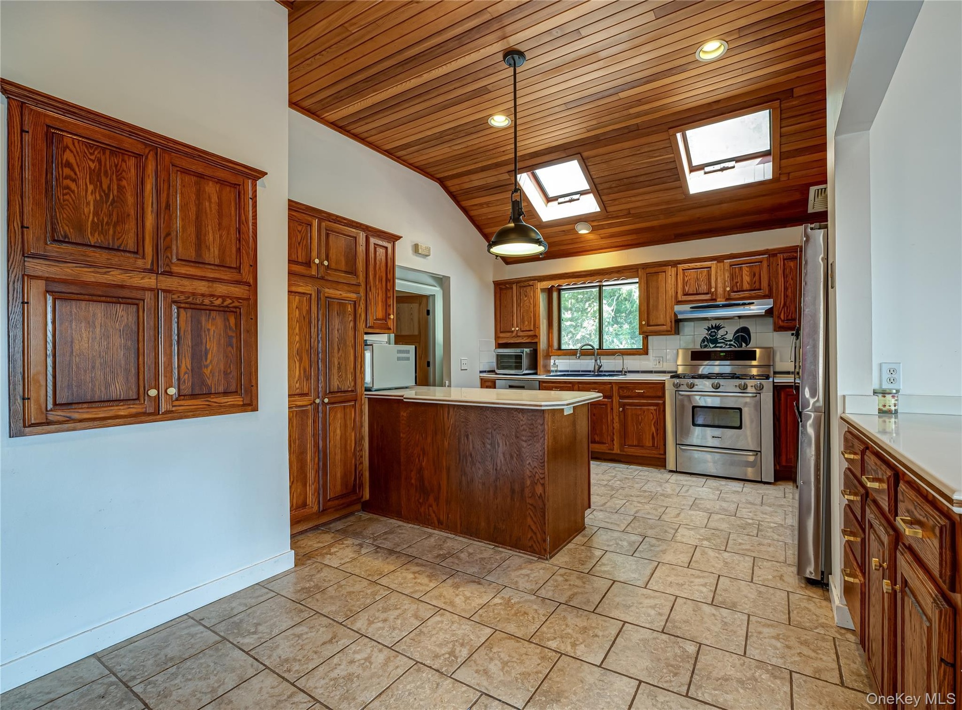 Kitchen with Stainless Appliances  & Pantry