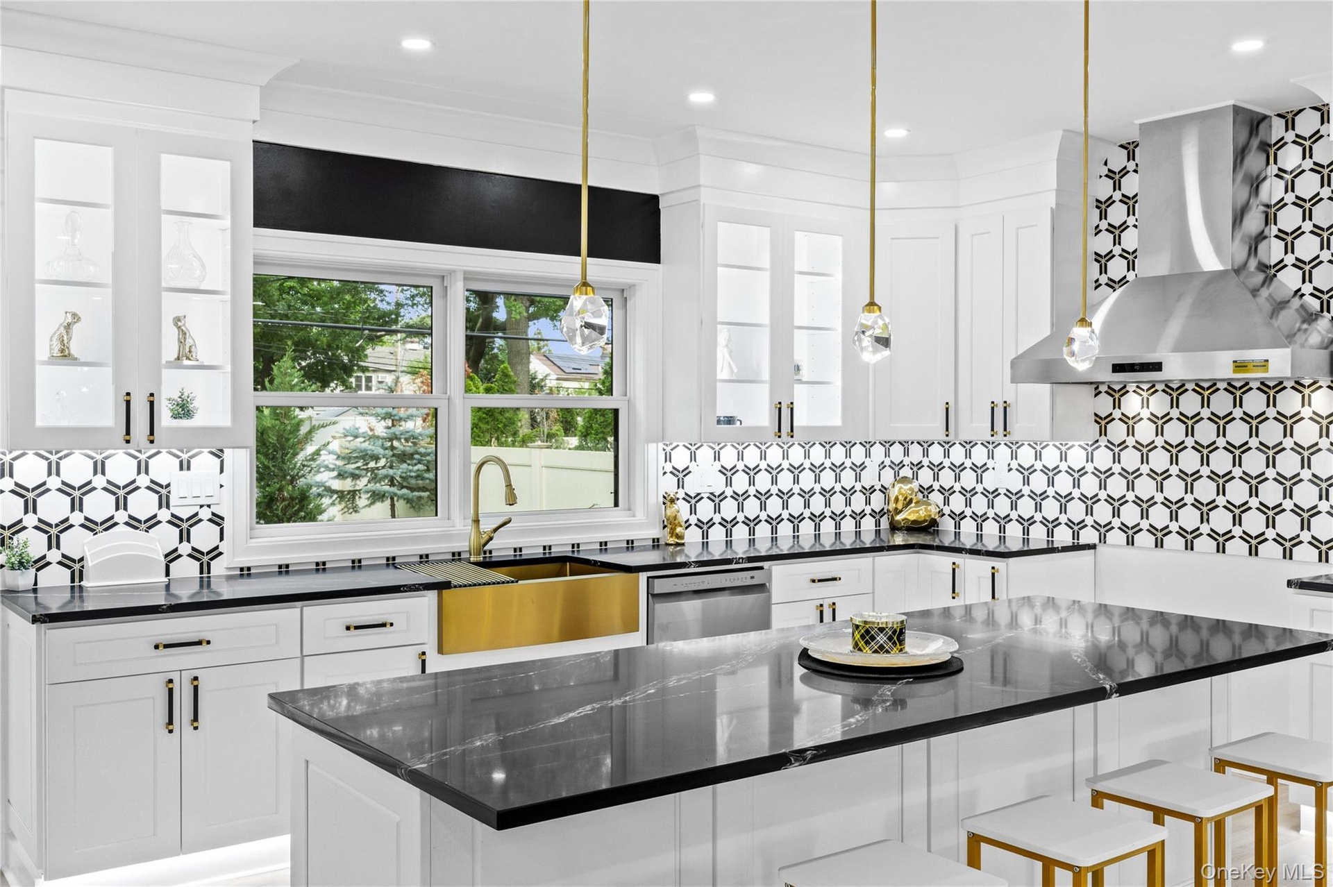 CUSTOM ORIGINAL DESIGN with marble backsplash and gold accents