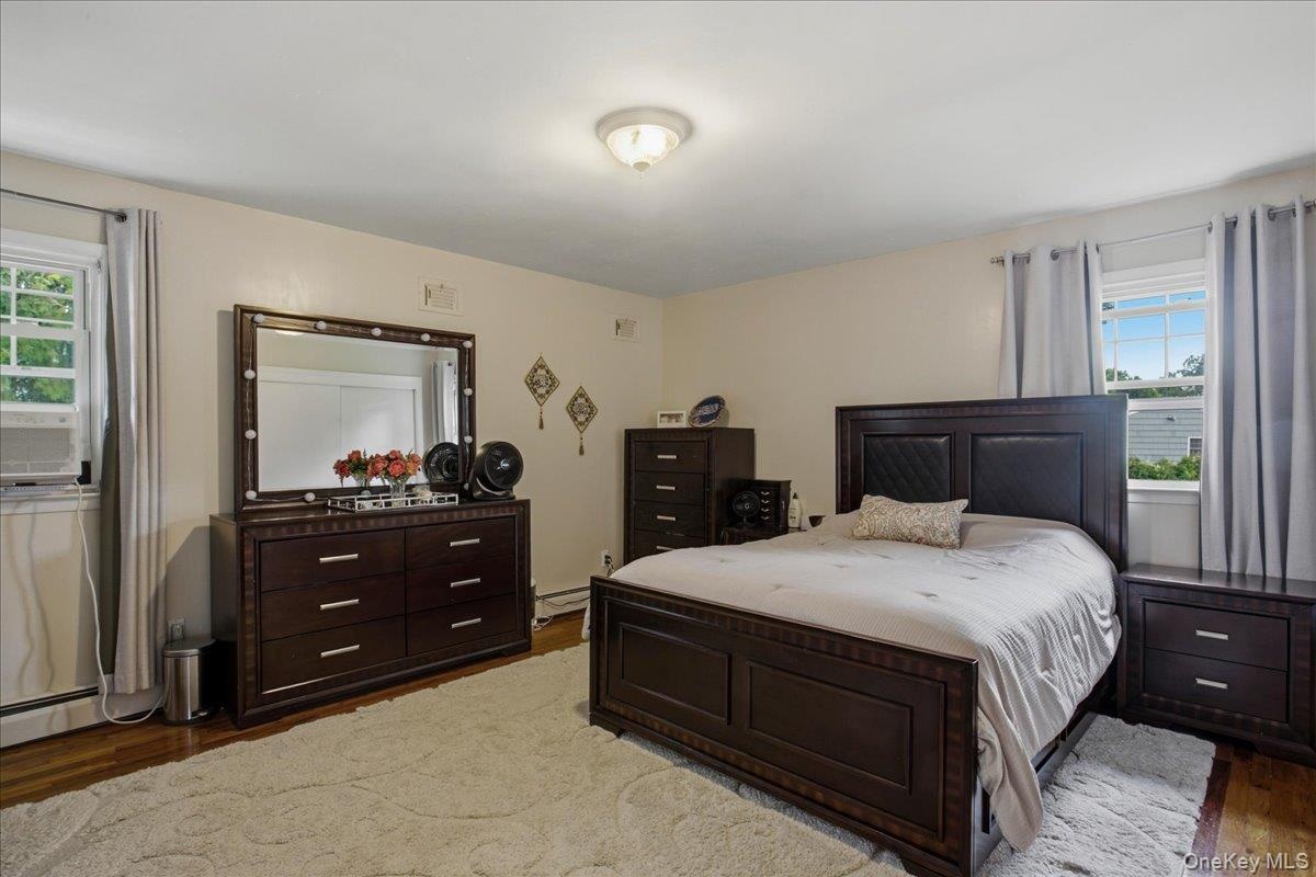 Master bedroom. Hardwood-style flooring throughout