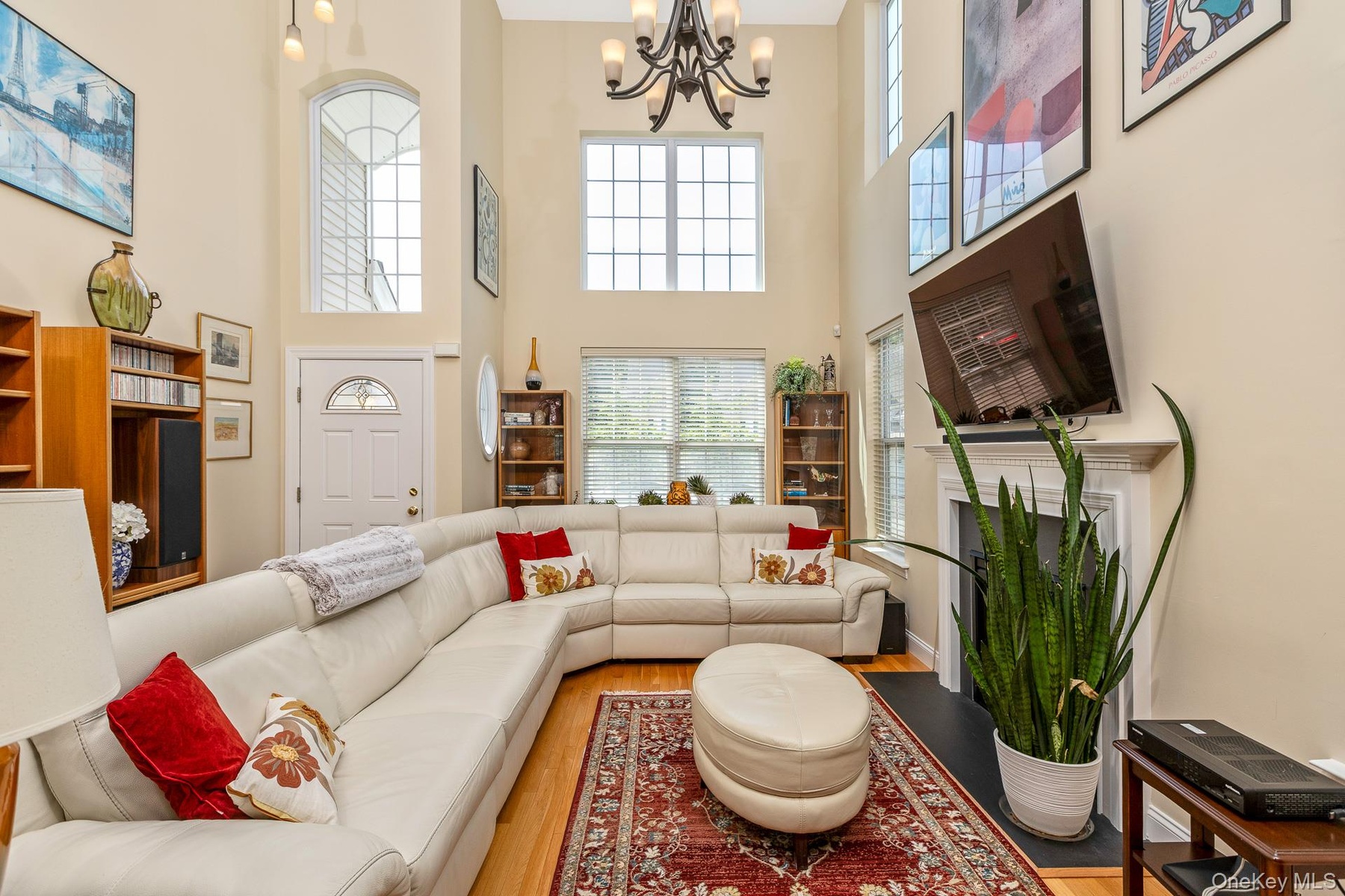 Two-story living area with high ceilings