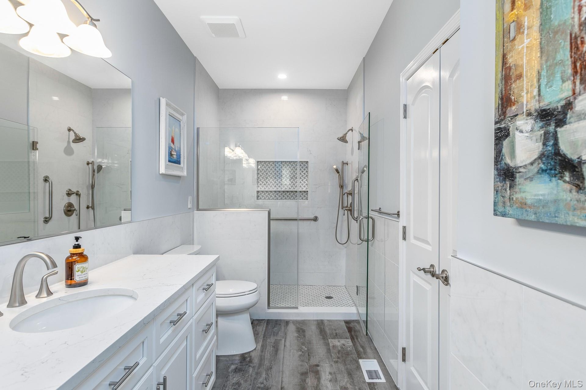 Contemporary Primary bathroom featuring a spacious glass-enclosed shower