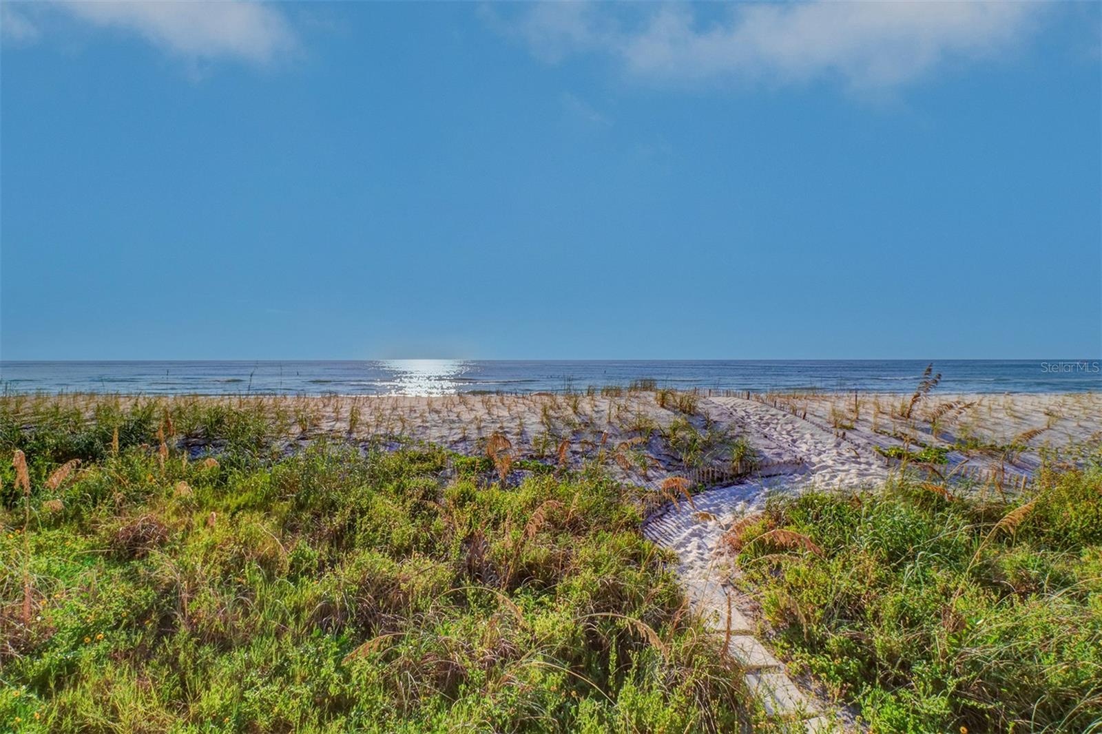 PRIVATE gated direct access to the beach from DOLPHIN REEF CONDO pool deck