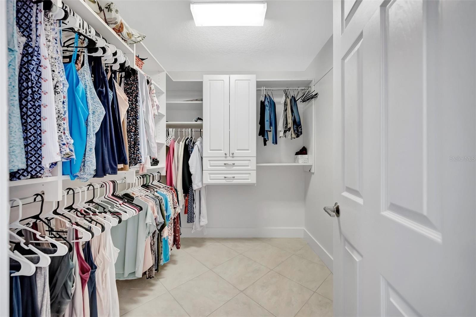One of Two Primary Bedroom walk-in closets