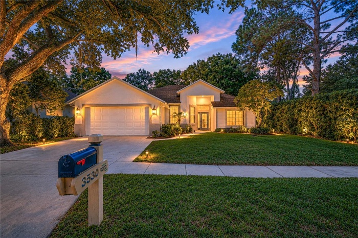 Beautifully updated residence in the gated River Hills community.