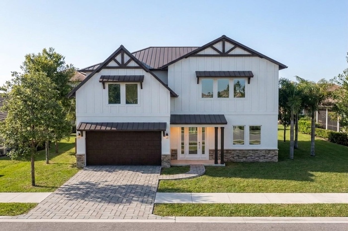 This Photo is an Architectural Rendering of the Home as it Will Look Once Completed.