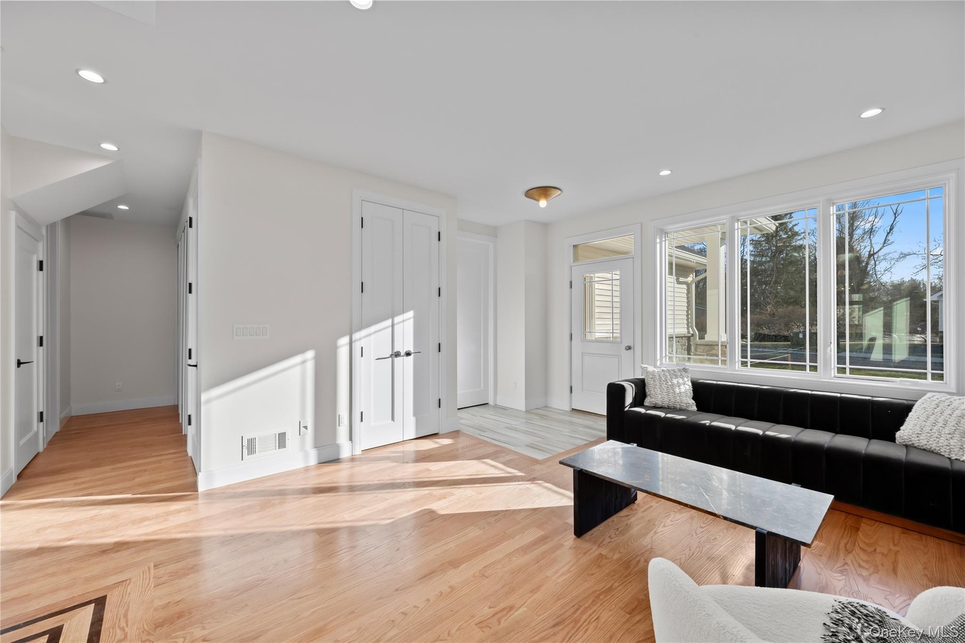 Living room featuring recessed lighting and light wood finished floors