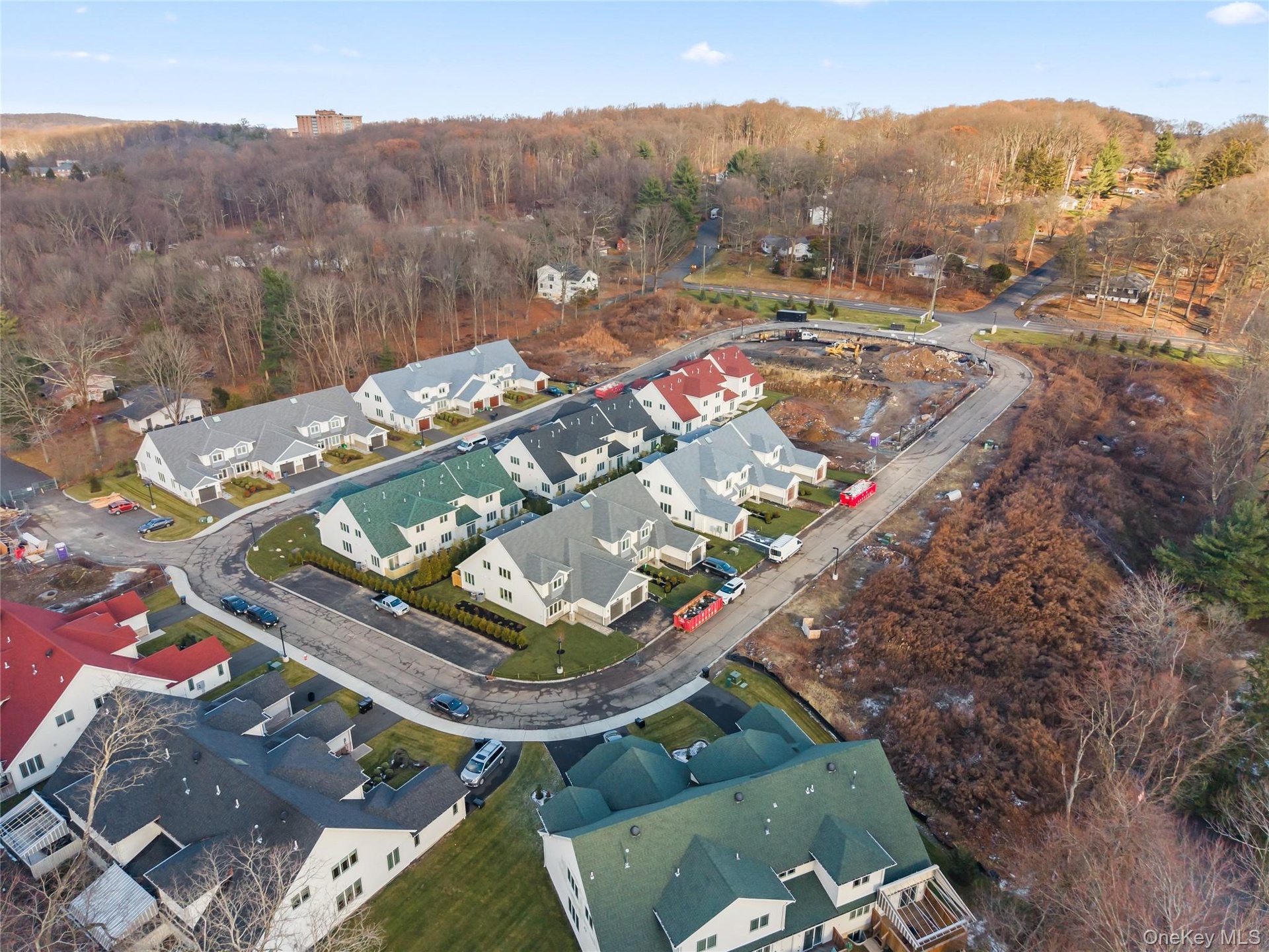 View of property location with nearby suburban area