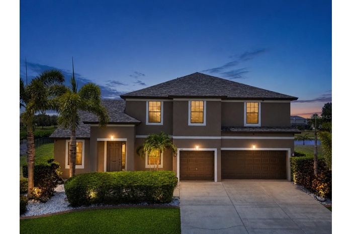 Stunning curb appeal featuring beautifully maintained landscaping and inviting exterior charm.