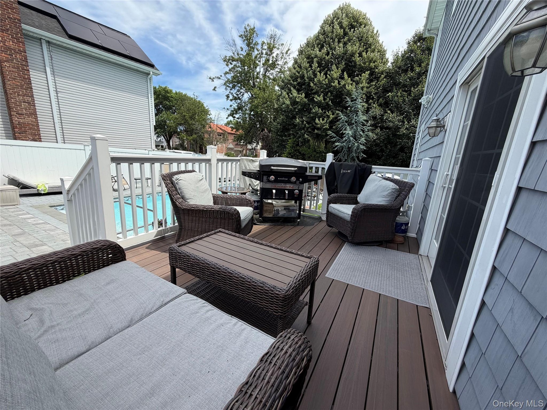 Back deck overlooking your backyard oasis