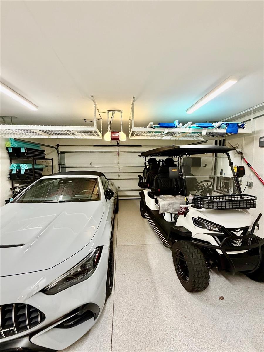 Spacious two car garage with abundant storage for all of your beach and boating gear