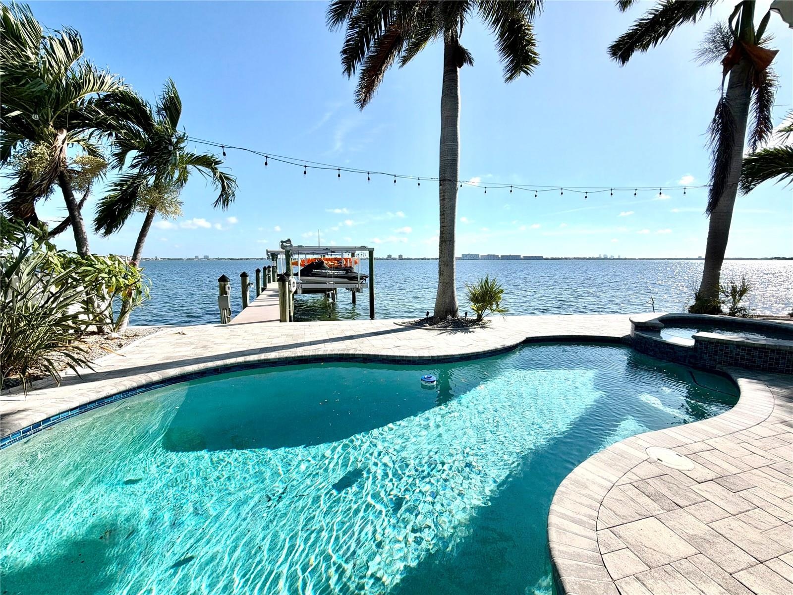 Private dock with boat and jet ski lifts for effortless days on the water