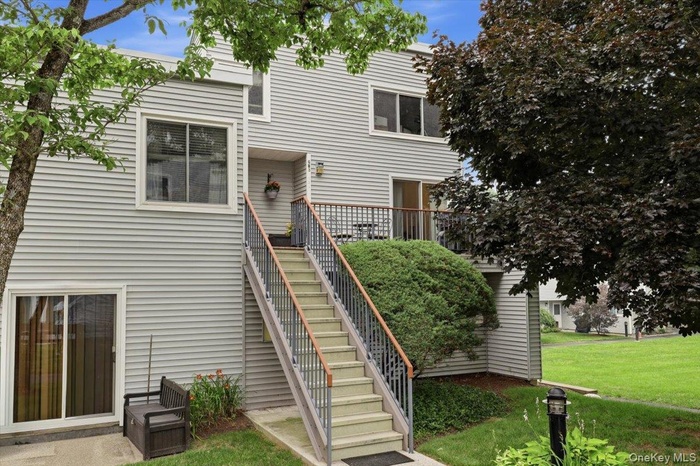 Bedford Mews second floor end unit with lots of light, terrace and fireplace