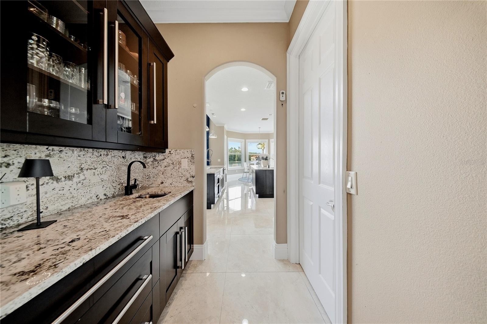 Wet bar with custom cabinetry