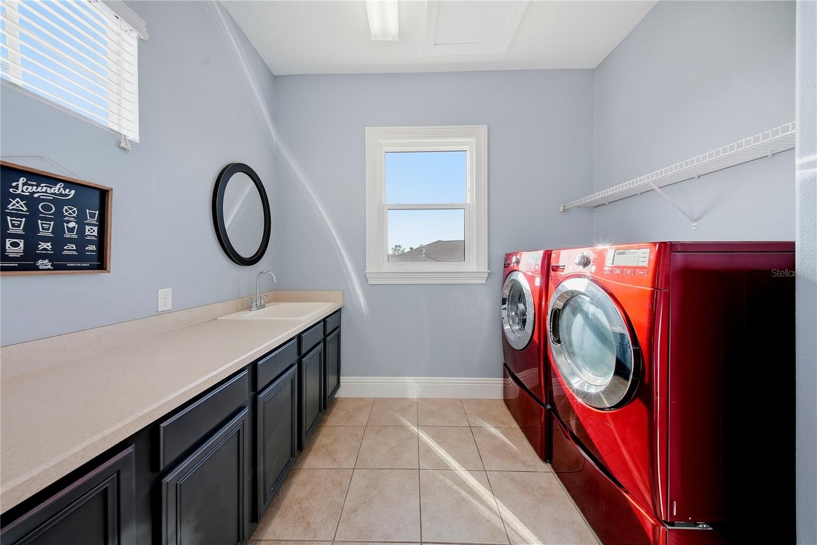 The laundry is upstairs and has plenty of room for all the essentials.