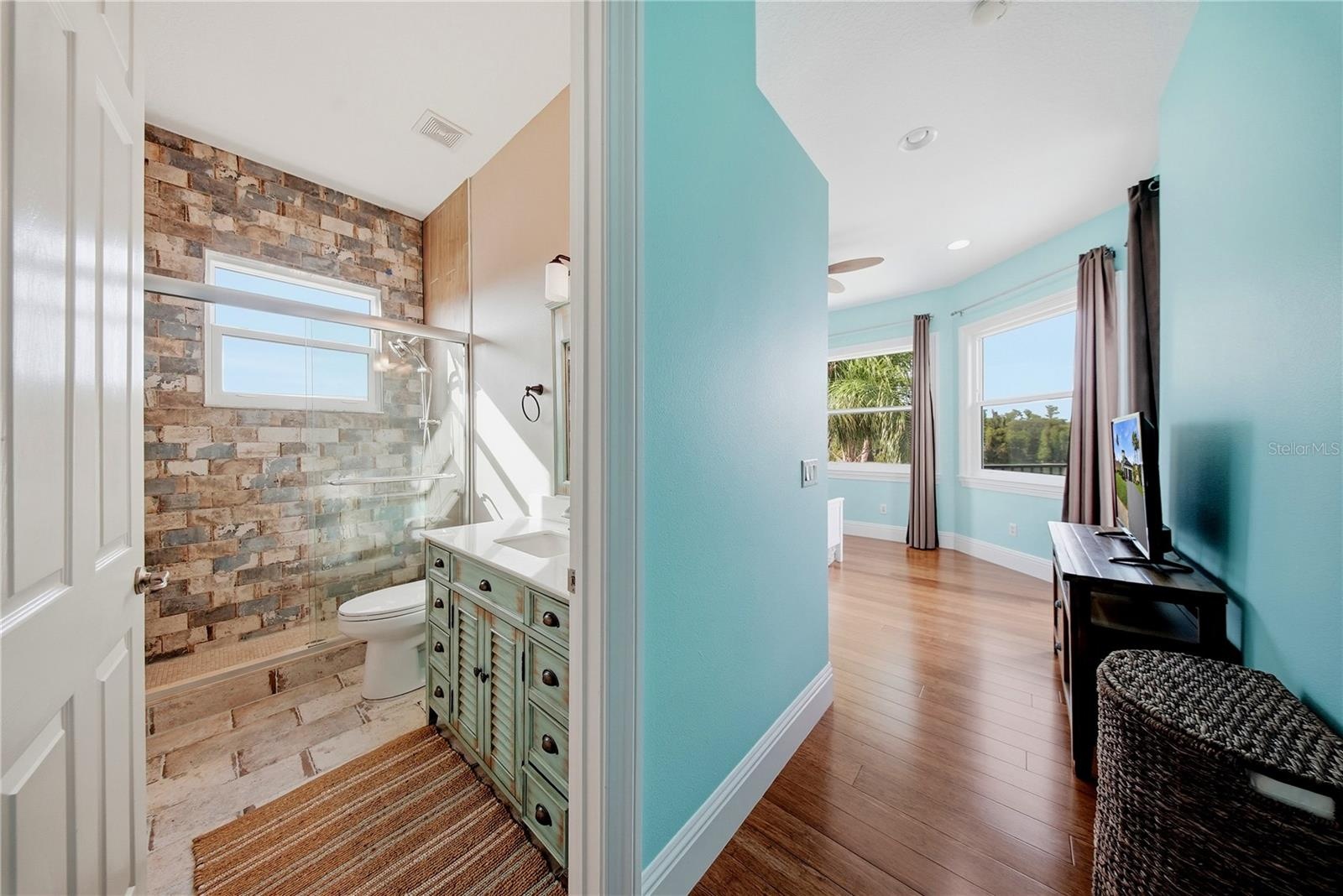This bathroom is a part of the ensuite bedroom.