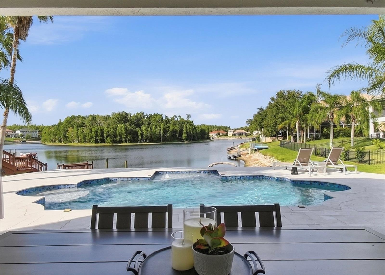 Lower level Lanai with pool/lake views