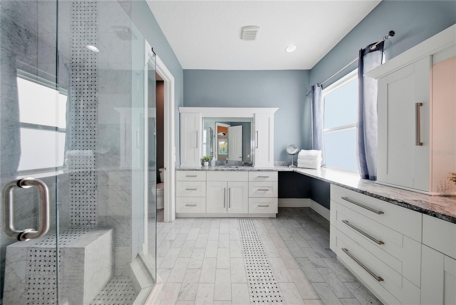 This master bath has a spa quality with Turkish marble throughout