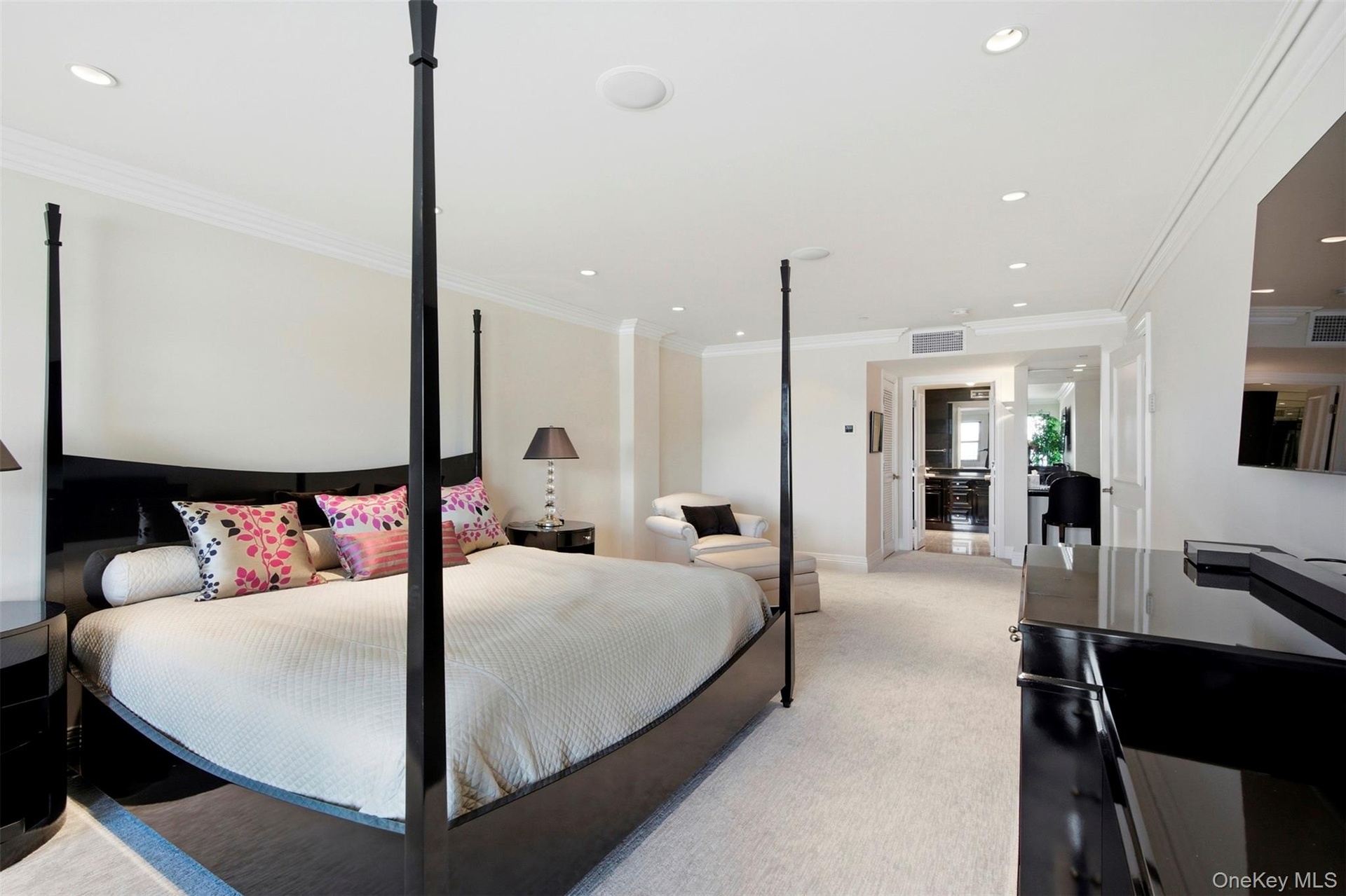 Looking toward the walk-in closet and en suite bath.