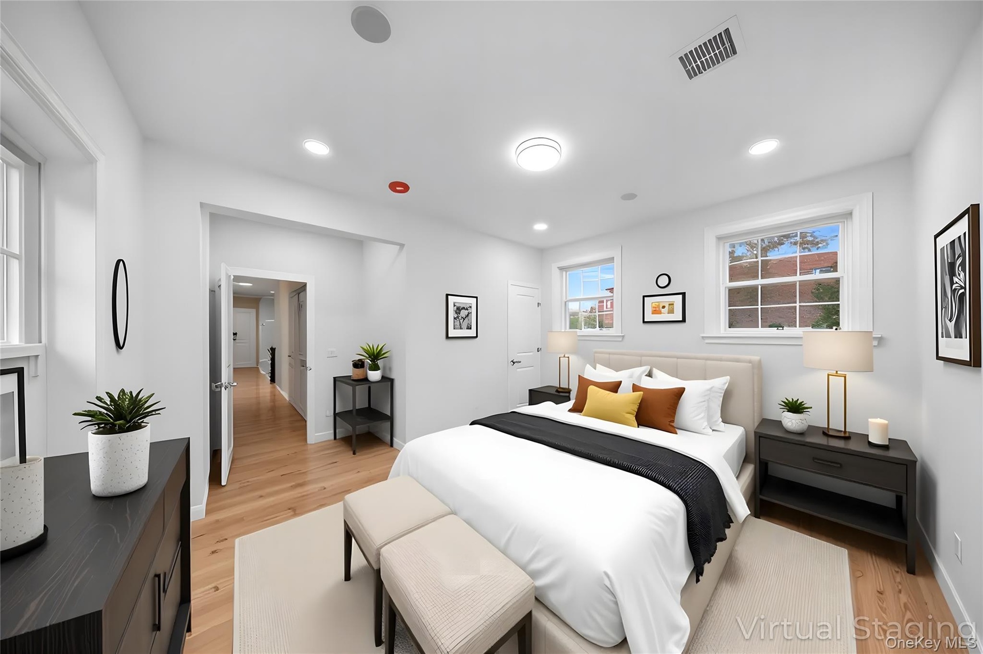 Bedroom featuring light wood finished floors and recessed lighting