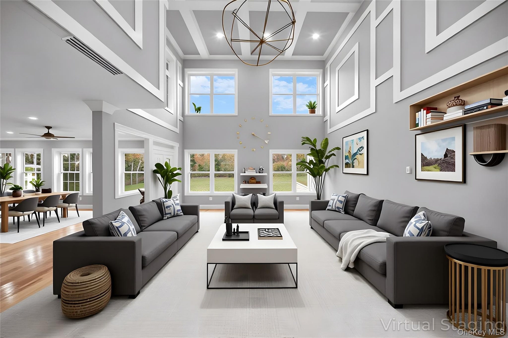 Living area featuring a chandelier, a high ceiling, wood finished floors, recessed lighting, and ornamental molding