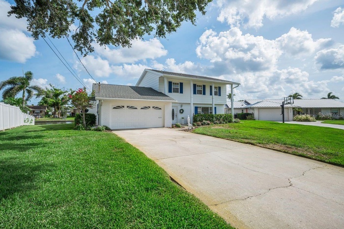 Spacious lot overlooking the water with 2-story home