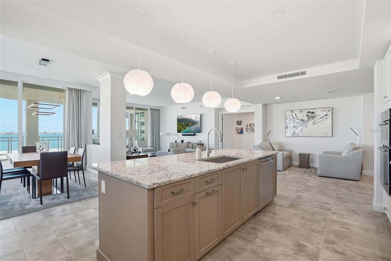 Kitchen island with seating and abundant prep space.