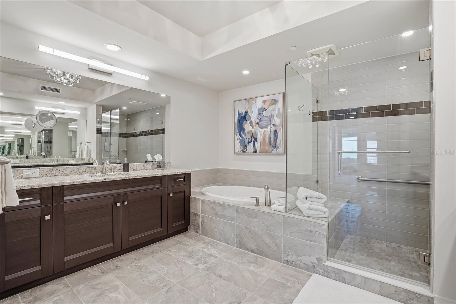 Spa-inspired primary ensuite bath.  Large walk-in shower and soaking tub.