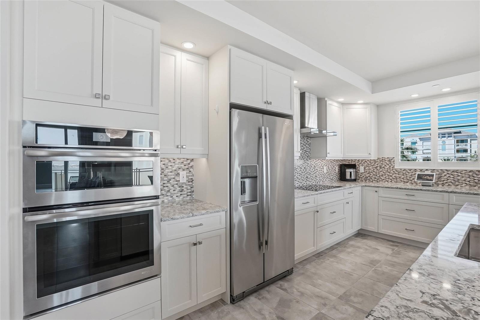 Beautifully designed kitchen with coastal-inspired finishes and Jenn-Air appliances.