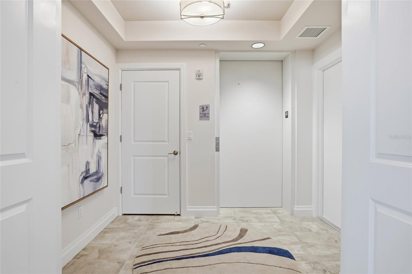 Dedicated private foyer, storage closet with semi-private elevator access.