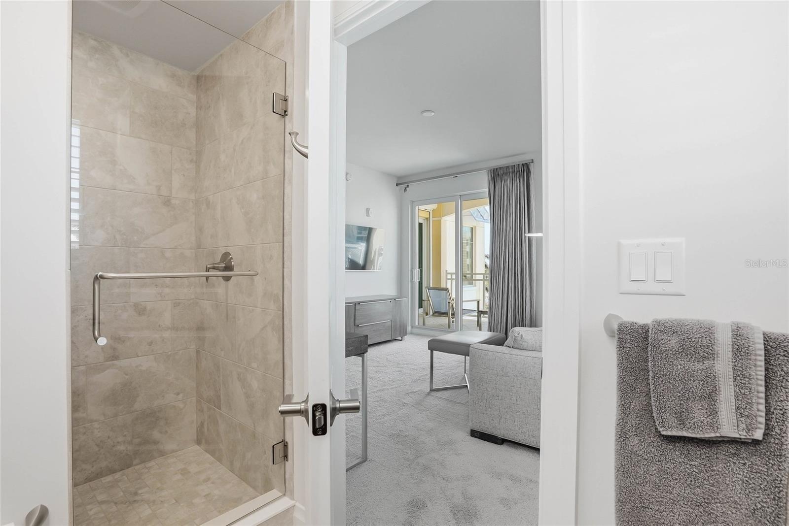 Walk-in shower in ensuite bath for bedroom #3.