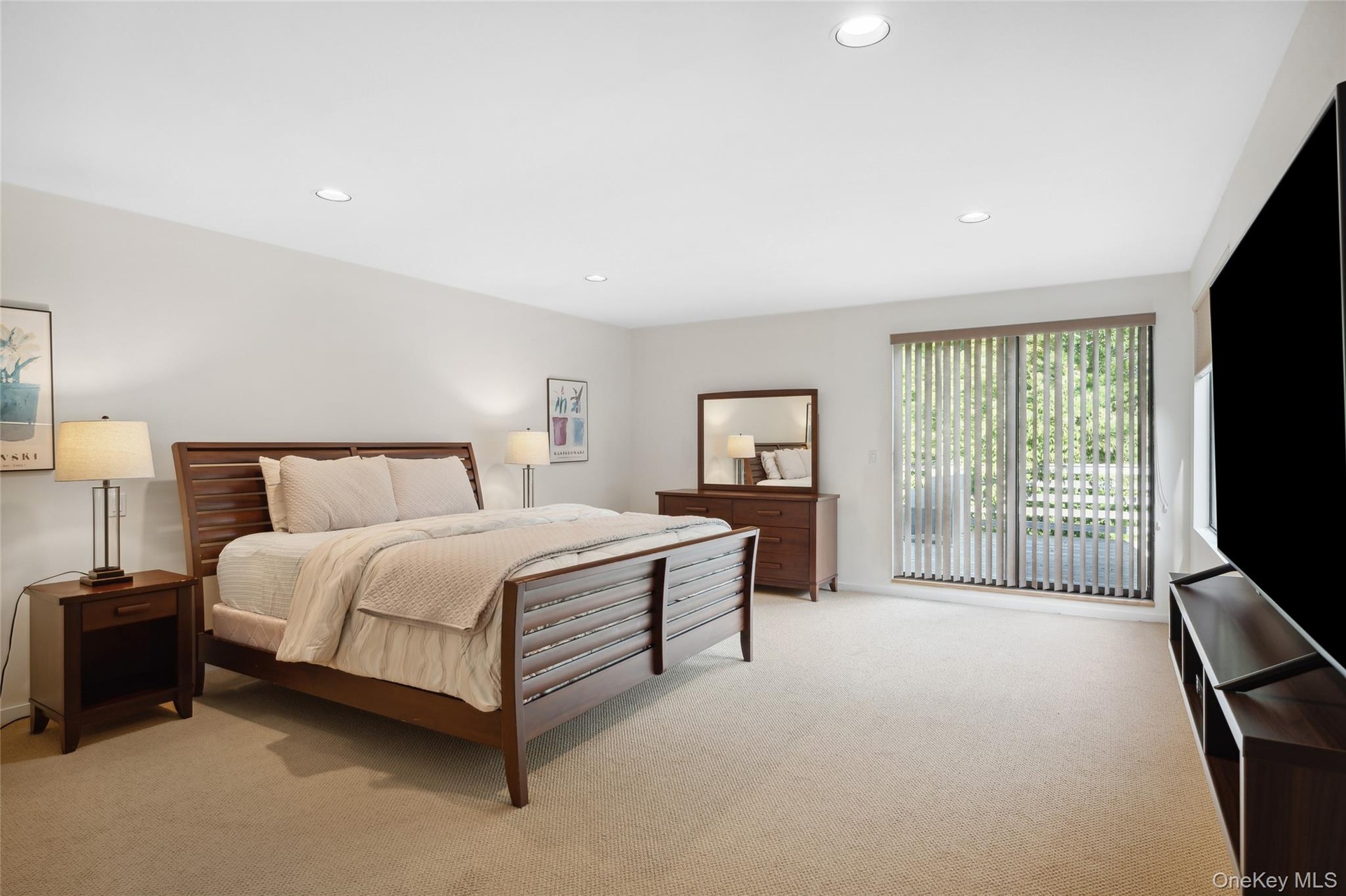 Bedroom featuring recessed lighting and light colored carpet
