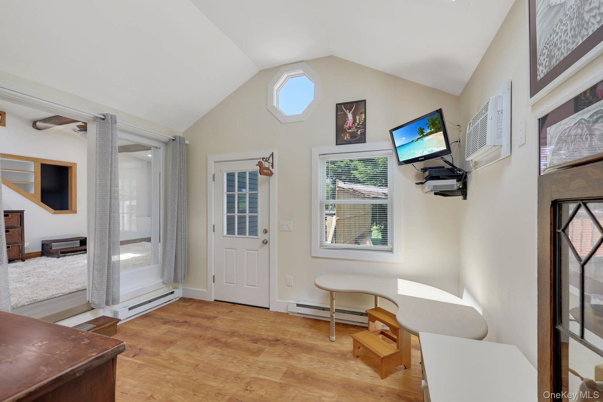Home Office with separate entrance off back deck.
