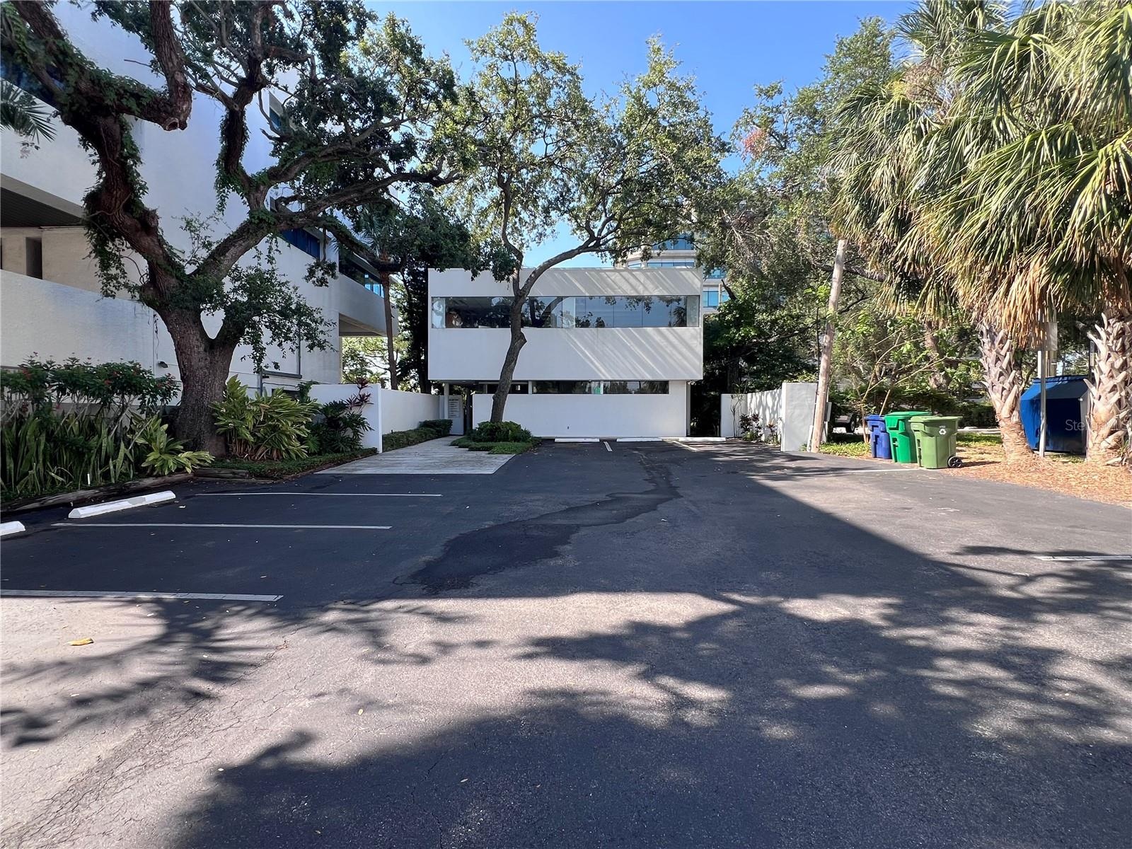 Rear of building and parking from Deleon St