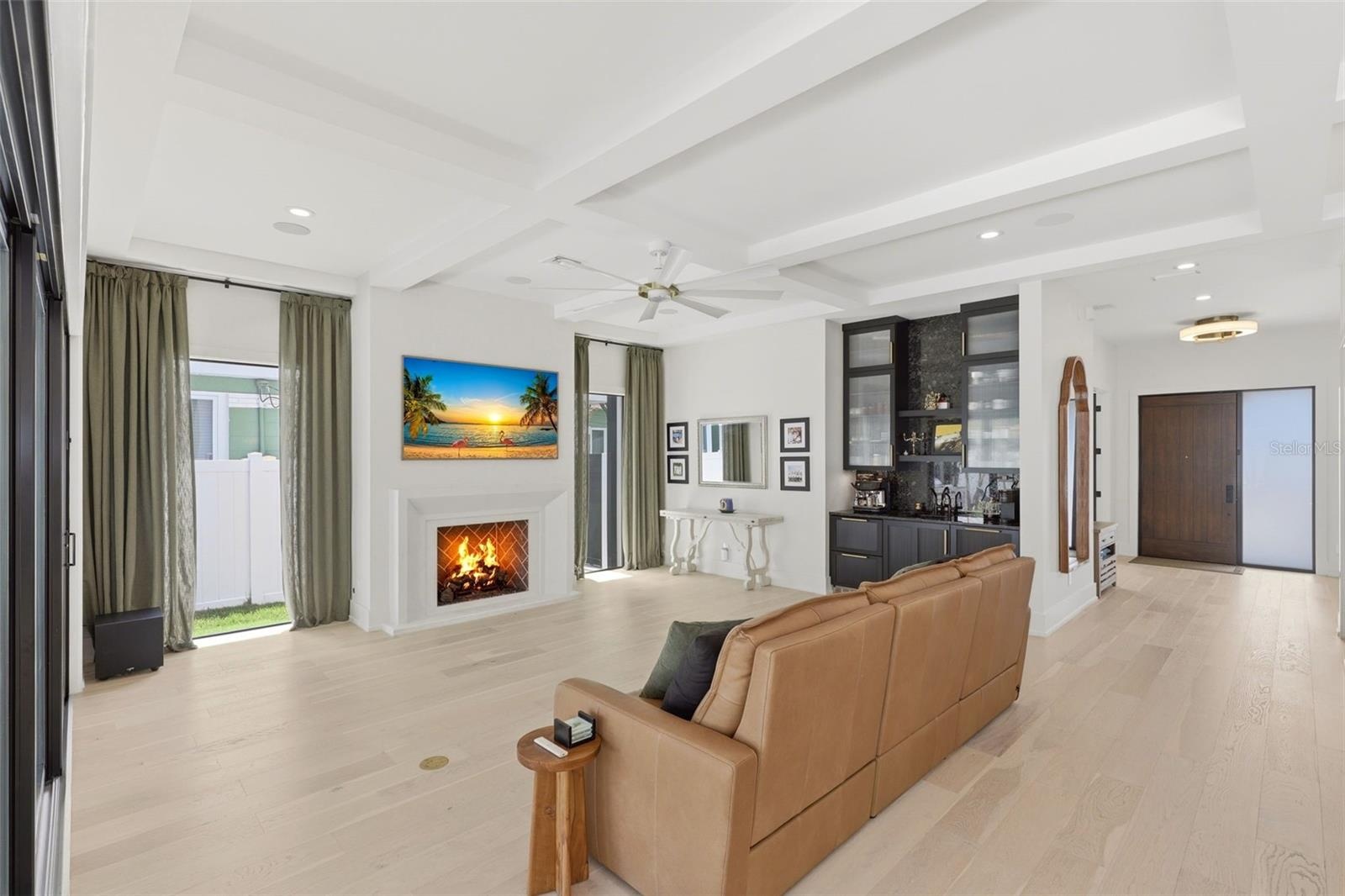 Elongated windows, gas fireplace and wet bar