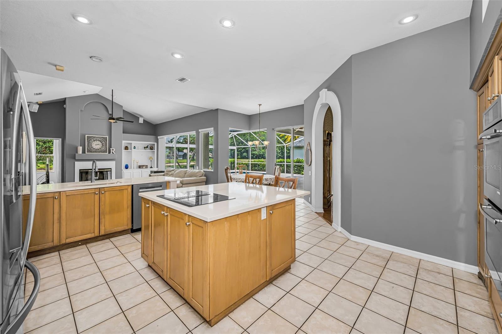 Kitchen with Jenn-Aire cooktop in island