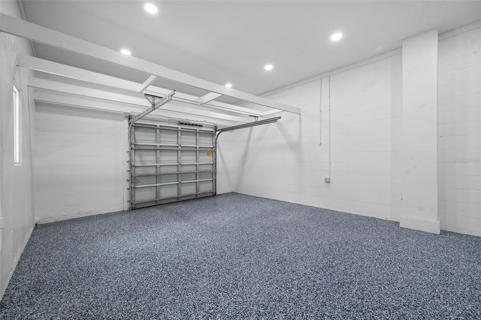 Garage Features an Epoxy-Coated Floor
