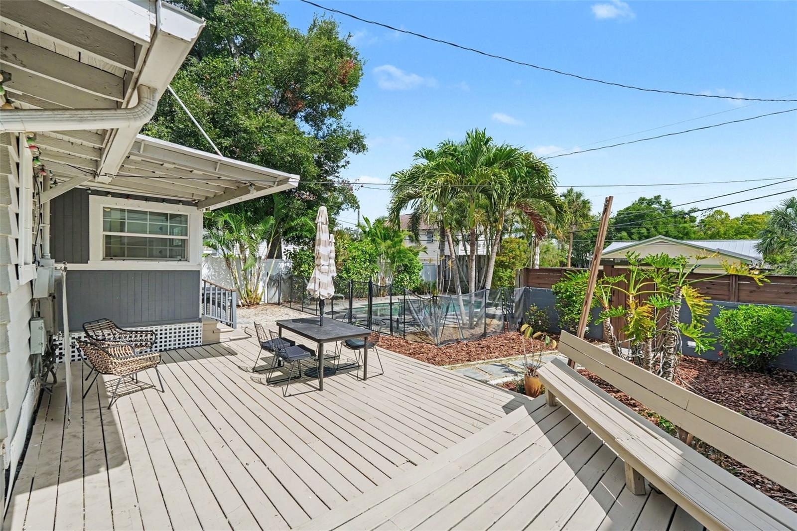 Step outside to a spacious deck with room for outdoor dining, lounging, and entertaining beneath the Florida sunshine.