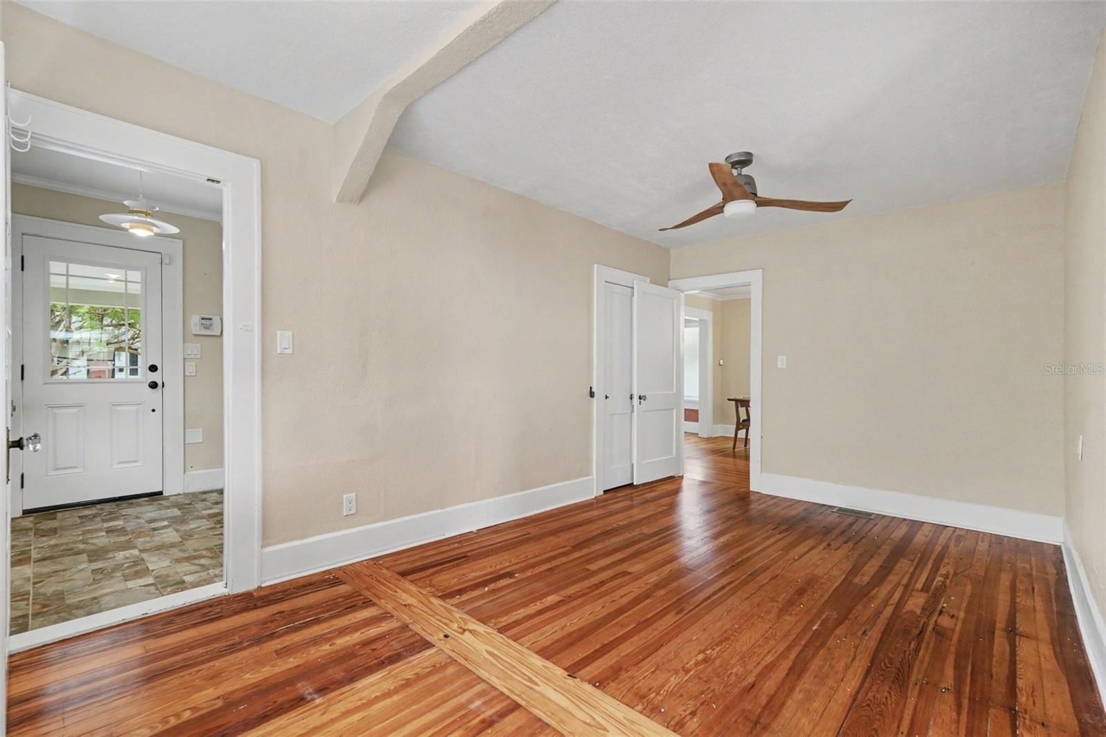 The first-floor bedroom offers valuable flexibility as a guest room, home office, den, or private retreat.