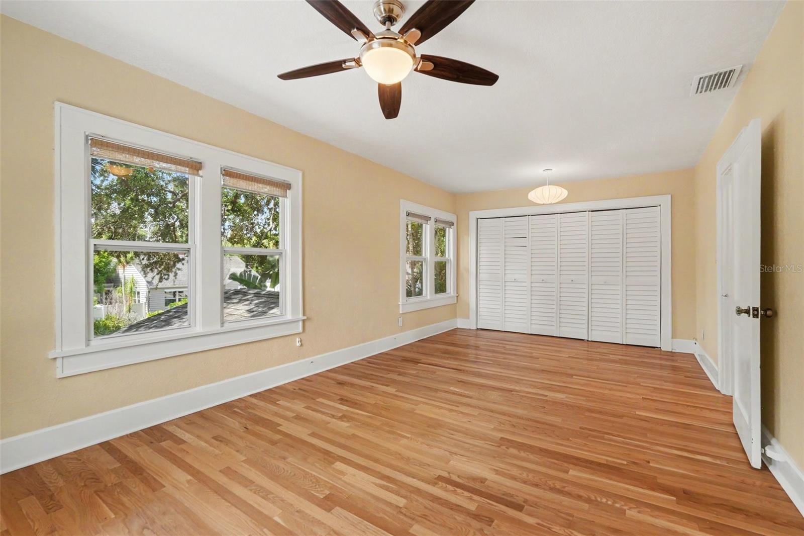 Upstairs, the spacious primary bedroom offers abundant natural light, generous storage, and room to truly unwind.
