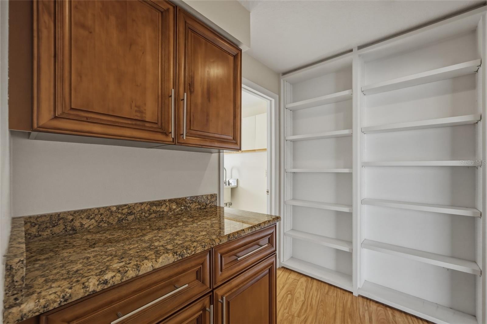 HALL AREA TO THE 2 BEDROOMS AND FULL BATH