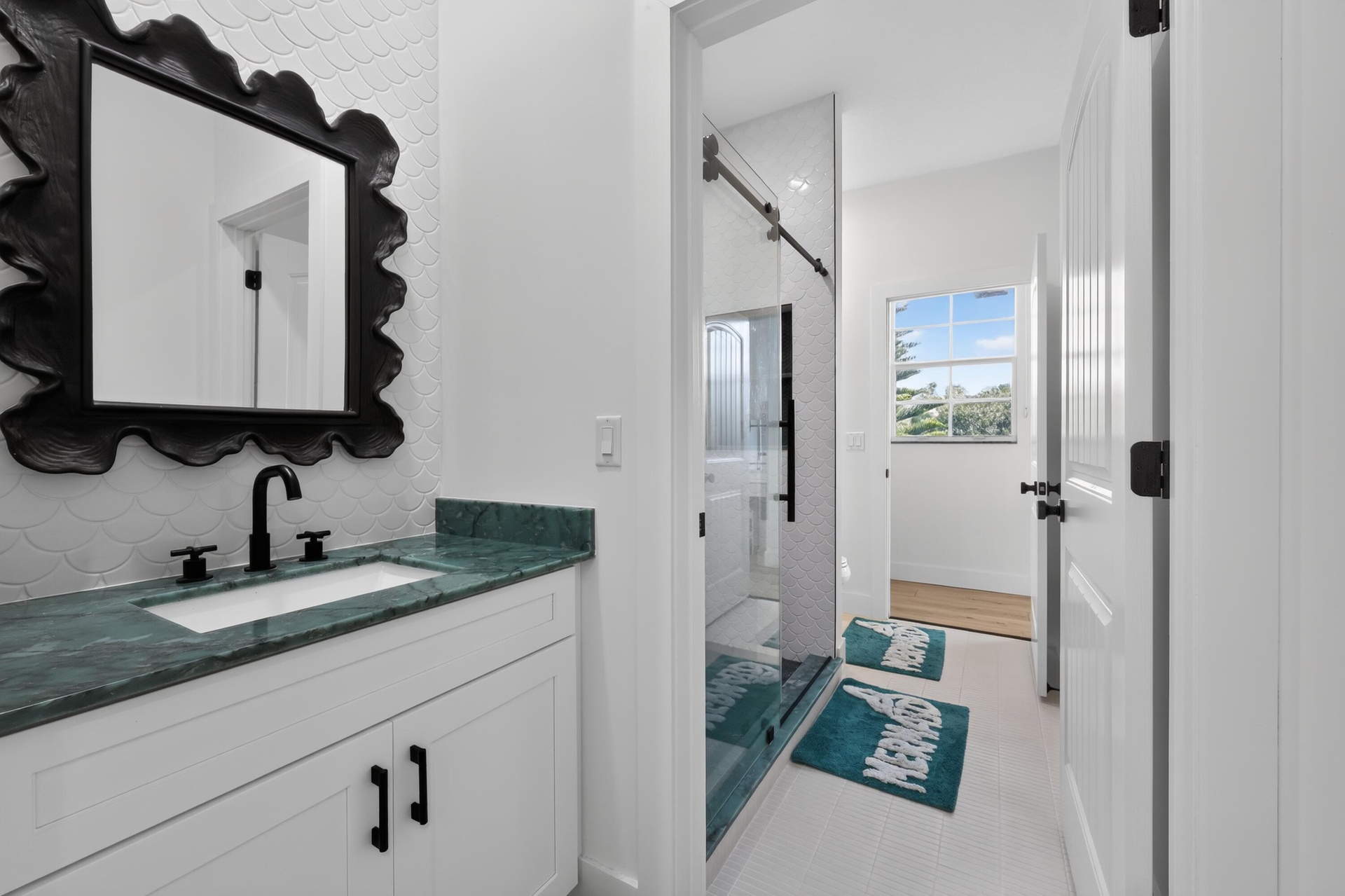 Bathroom jack and Jill style between bedrooms 2 & 3