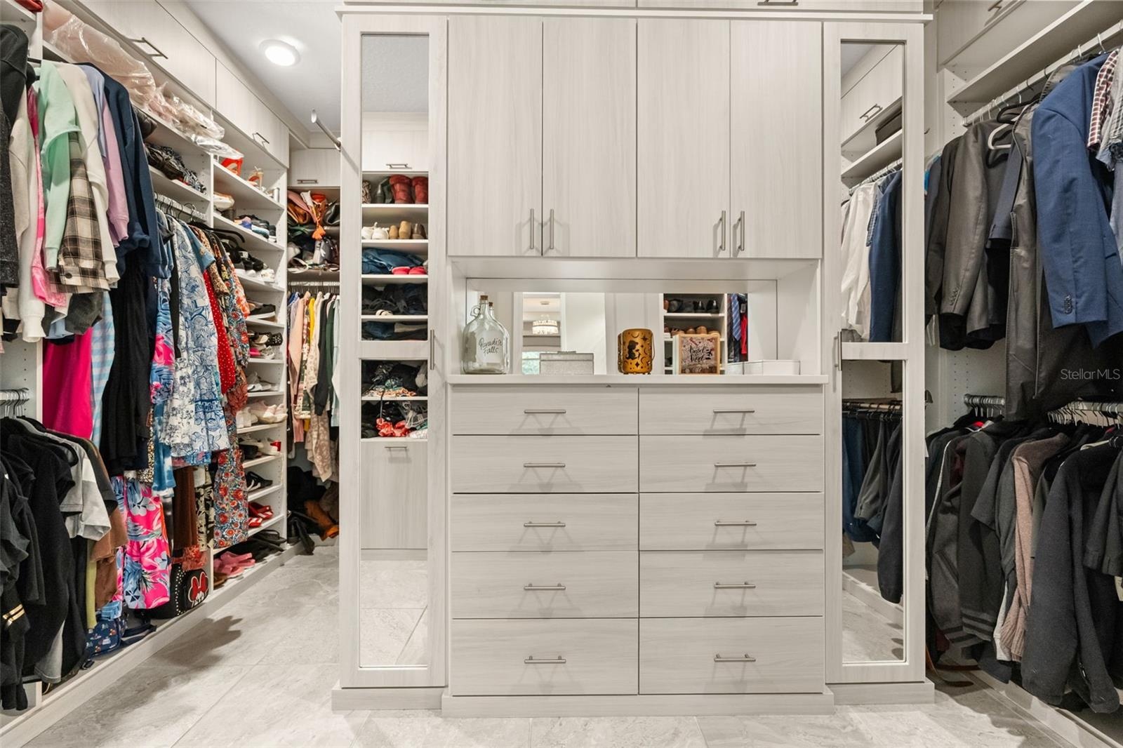 Primary closet with custom built ins