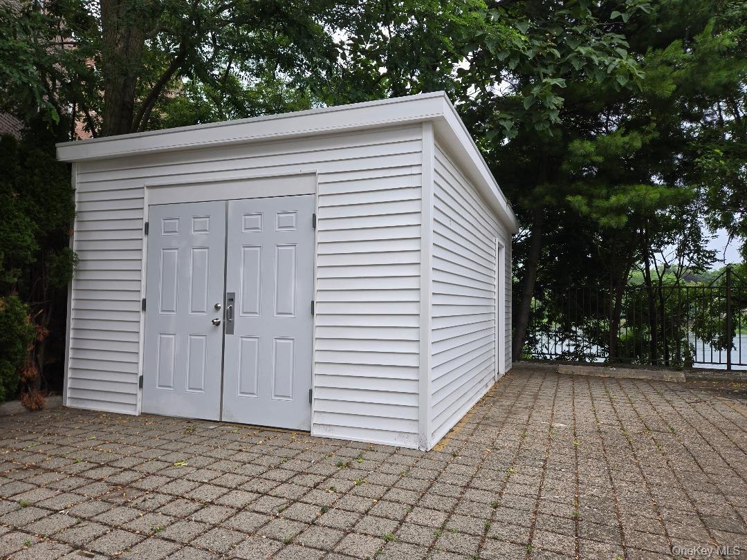 Brand new and huge Shed to halp you organize the refuse and recylce bins.