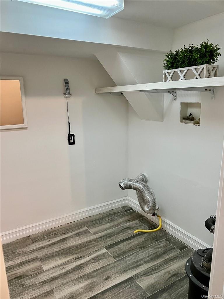 Laundry room, showing the washer/dryer hookups. (bring your own washer and dryers) Located off the Den in the 1st Level, next to the garage.