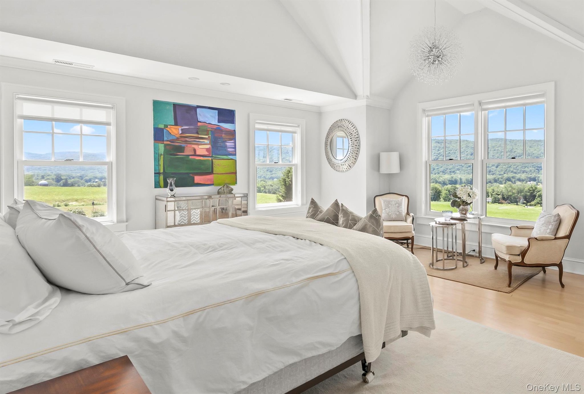 The Large Primary Bedroom Suite Enjoys Abundant Light, Vaulted Ceiling and Spectacular Views