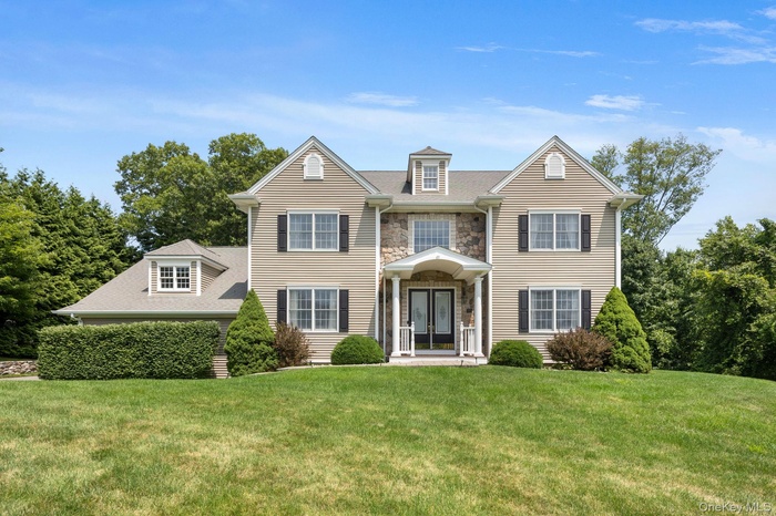 Beautifully designed Colonial in the highly sought-after Windsor Woods neighborhood, complete with a legal one-bedroom accessory apartment—offering ex